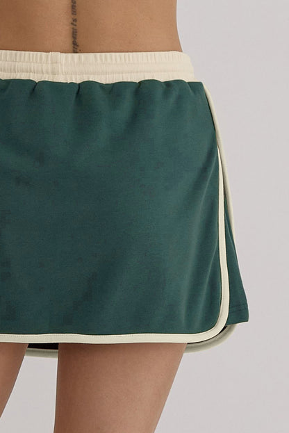 Evergreen Contrast Trim Loose Pullover and Lace-up Waist Skort Set